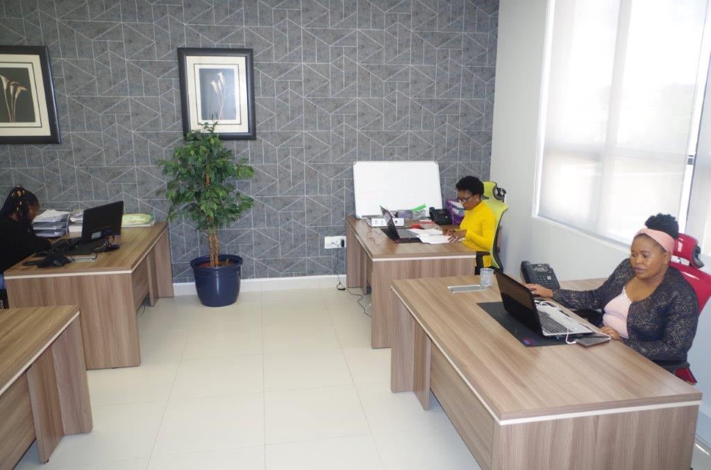 The open-plan MTA office with consultants at their desks