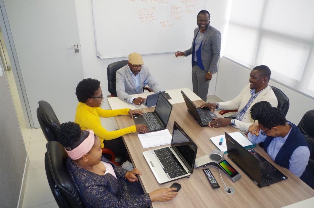 MTA consultants in a team meeting